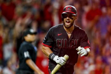 Sep 1, 2023; Cincinnati, Ohio, USA; Cincinnati Reds right fielder Hunter Renfroe (32) reacts after hitting a solo home run in the ninth inning against the Chicago Cubs at Great American Ball Park. Mandatory Credit: Katie Stratman-USA TODAY Sports