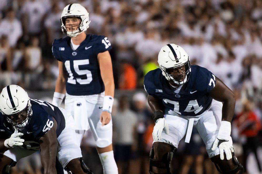 Penn State left tackle Olu Fashanu (74) gets set before a play against West Virginia at Beaver Stadium September 2, 2023, in State College.