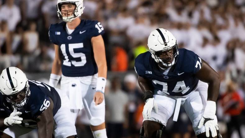 Penn State left tackle Olu Fashanu (74) gets set before a play against West Virginia at Beaver Stadium September 2, 2023, in State College.