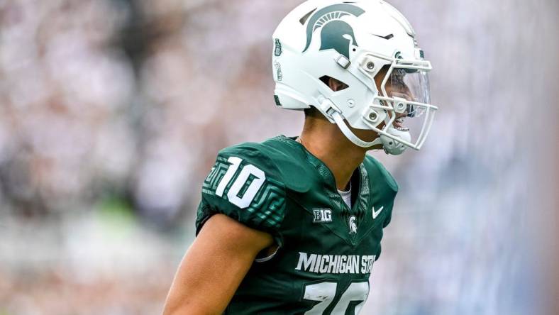 Michigan State's Noah Kim heads to the sideline after throwing a touchdown against Richmond during the second quarter on Saturday, Sept. 9, 2023, at Spartan Stadium in East Lansing.