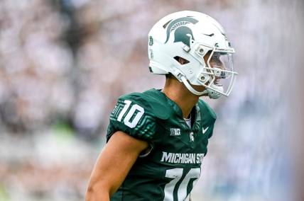 Michigan State's Noah Kim heads to the sideline after throwing a touchdown against Richmond during the second quarter on Saturday, Sept. 9, 2023, at Spartan Stadium in East Lansing.
