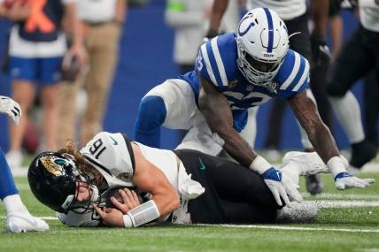 Former Colts linebacker Shaquille Leonard (53) covers Jacksonville Jaguars quarterback Trevor Lawrence (16) as he goes to the turf Sunday, Sept. 10, 2023, during a game against the Jacksonville Jaguars at Lucas Oil Stadium in Indianapolis.