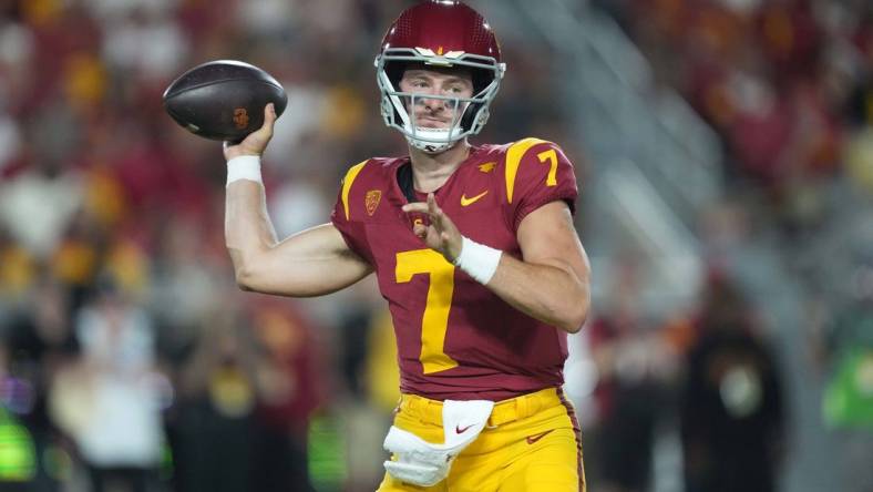 Sep 9, 2023; Los Angeles, California, USA; Southern California Trojans quarterback Miller Moss (7) throws the ball against the Stanford Cardinal in the second half at United Airlines Field at Los Angeles Memorial Coliseum. Mandatory Credit: Kirby Lee-USA TODAY Sports