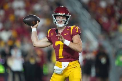 Sep 9, 2023; Los Angeles, California, USA; Southern California Trojans quarterback Miller Moss (7) throws the ball against the Stanford Cardinal in the second half at United Airlines Field at Los Angeles Memorial Coliseum. Mandatory Credit: Kirby Lee-USA TODAY Sports