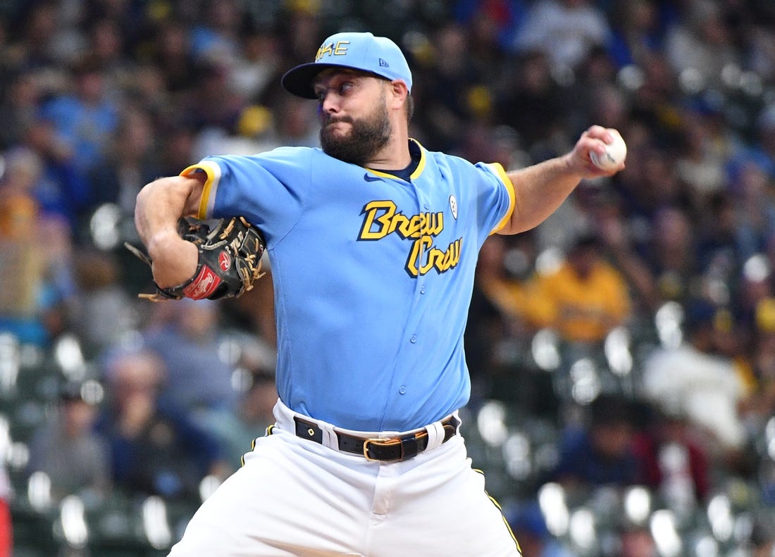 Sep 15, 2023; Milwaukee, Wisconsin, USA; Milwaukee Brewers starting pitcher Wade Miley (20) delivers a pitch against the Washington Nationals in the first inning at American Family Field. Mandatory Credit: Michael McLoone-USA TODAY Sports