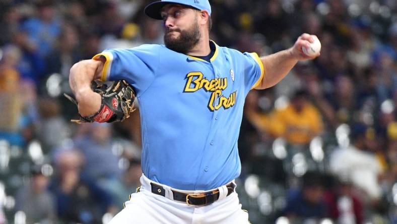 Sep 15, 2023; Milwaukee, Wisconsin, USA; Milwaukee Brewers starting pitcher Wade Miley (20) delivers a pitch against the Washington Nationals in the first inning at American Family Field. Mandatory Credit: Michael McLoone-USA TODAY Sports