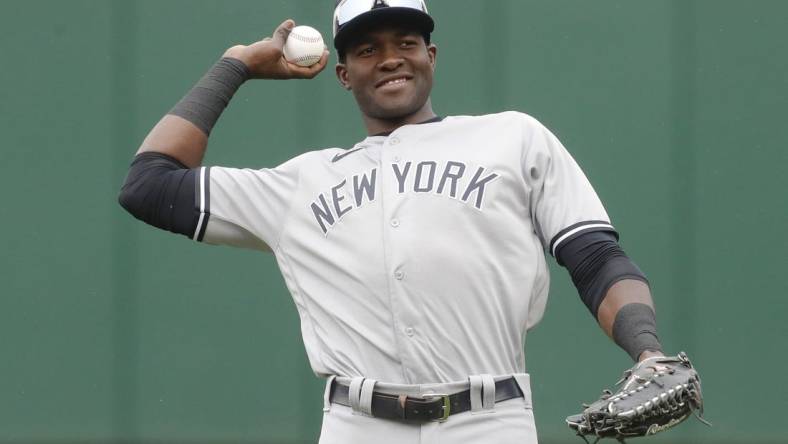 Sep 17, 2023; Pittsburgh, Pennsylvania, USA; New York Yankees center fielder Estevan Florial (90) warms up before the game against the Pittsburgh Pirates at PNC Park. Mandatory Credit: Charles LeClaire-USA TODAY Sports