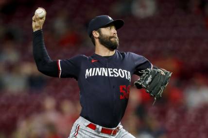 Sep 19, 2023; Cincinnati, Ohio, USA; Minnesota Twins relief pitcher Dylan Floro (58) pitches against the Cincinnati Reds in the ninth inning at Great American Ball Park. Mandatory Credit: Katie Stratman-USA TODAY Sports