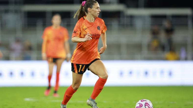 Sep 15, 2023; Louisville, Kentucky, USA;  Houston Dash midfielder Marisa Viggiano (14) during the second half against Racing Louisville FC at Lynn Family Stadium. Mandatory Credit: EM Dash-USA TODAY Sports