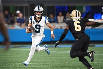 Sep 18, 2023; Charlotte, North Carolina, USA;  Carolina Panthers quarterback Bryce Young (9) looks to pass as New Orleans Saints safety Marcus Maye (6) defends in the first quarter at Bank of America Stadium. Mandatory Credit: Bob Donnan-USA TODAY Sports