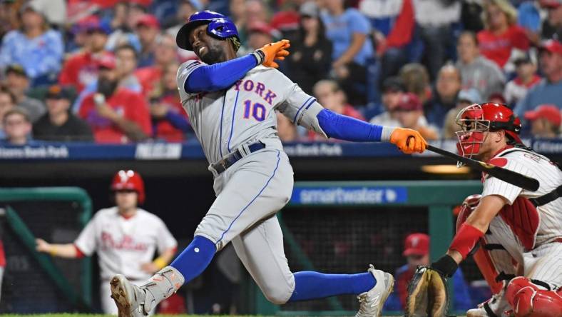 Sep 24, 2023; Philadelphia, Pennsylvania, USA; New York Mets shortstop Ronny Mauricio (10) hits a two run home run during the sixth inning against the Philadelphia Phillies at Citizens Bank Park. Mandatory Credit: Eric Hartline-USA TODAY Sports