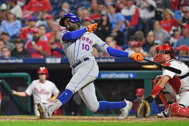 Sep 24, 2023; Philadelphia, Pennsylvania, USA; New York Mets shortstop Ronny Mauricio (10) hits a two run home run during the sixth inning against the Philadelphia Phillies at Citizens Bank Park. Mandatory Credit: Eric Hartline-USA TODAY Sports