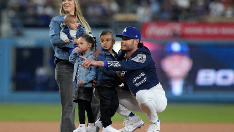 Sep 22, 2023; Los Angeles, California, USA; Los Angeles Dodgers relief pitcher Joe Kelly (17) poses with wife Ashley Kelly (Ashley Parks) and children, sons Knox Kelly and Kai Kelly and twins Crue Kelly and Blake Kelly, at Dodger Stadium. Mandatory Credit: Kirby Lee-USA TODAY Sports