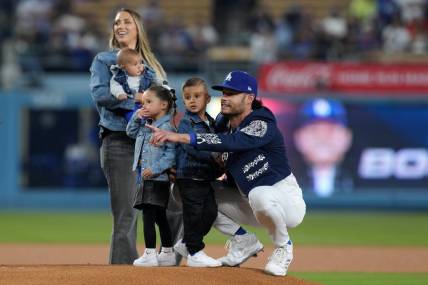Sep 22, 2023; Los Angeles, California, USA; Los Angeles Dodgers relief pitcher Joe Kelly (17) poses with wife Ashley Kelly (Ashley Parks) and children, sons Knox Kelly and Kai Kelly and twins Crue Kelly and Blake Kelly, at Dodger Stadium. Mandatory Credit: Kirby Lee-USA TODAY Sports