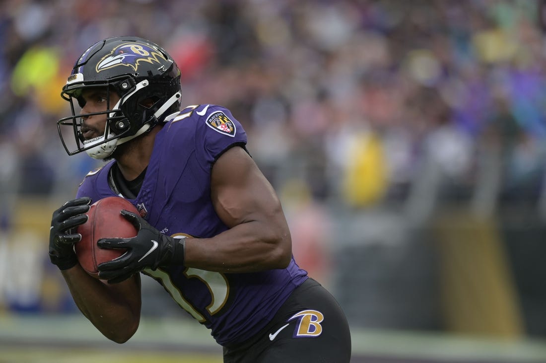 Sep 24, 2023; Baltimore, Maryland, USA; Baltimore Ravens wide receiver Devin Duvernay (13) returns a kick during the game against the Indianapolis Colts at M&T Bank Stadium. Mandatory Credit: Tommy Gilligan-USA TODAY Sports