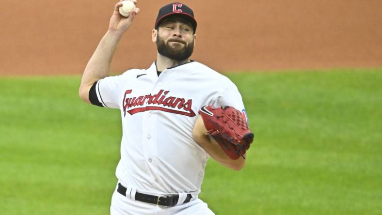 Sep 26, 2023; Cleveland, Ohio, USA; Cleveland Guardians starting pitcher Lucas Giolito (27) delivers a pitch in the first inning against the Cincinnati Reds at Progressive Field. Mandatory Credit: David Richard-USA TODAY Sports