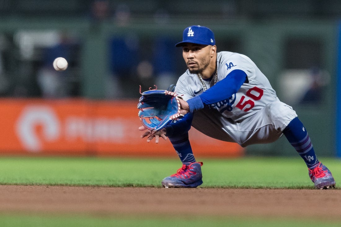 Sep 29, 2023; San Francisco, California, USA; Los Angeles Dodgers second baseman Mookie Betts (50) catches a shallow fly ball for an out against the San Francisco Giants  during the eighth inning at Oracle Park. Mandatory Credit: John Hefti-USA TODAY Sports