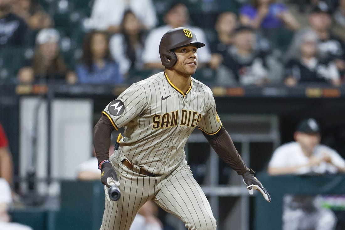 Sep 30, 2023; Chicago, Illinois, USA; San Diego Padres left fielder Juan Soto (22) watches his RBI-double against the Chicago White Sox during the second inning at Guaranteed Rate Field. Mandatory Credit: Kamil Krzaczynski-USA TODAY Sports