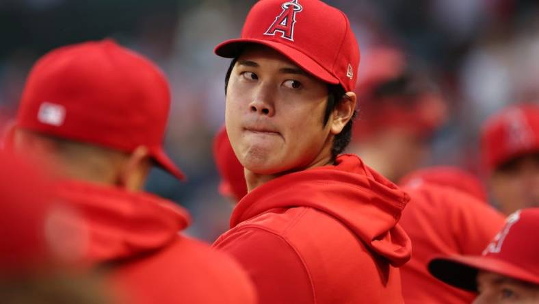 Sep 30, 2023; Anaheim, California, USA; Los Angeles Angels two-way player Shohei Ohtani (17) watches a game against the Oakland Athletics from the dugout at Angel Stadium. Mandatory Credit: Kiyoshi Mio-USA TODAY Sports