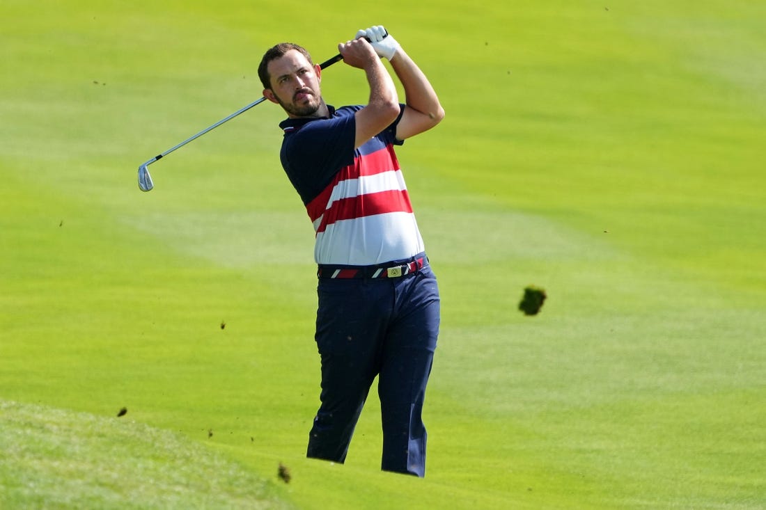 Oct 1, 2023; Rome, ITA; Team USA golfer Patrick Cantlay plays from the fairway on the second hole during the final day of the 44th Ryder Cup golf competition at Marco Simone Golf and Country Club. Mandatory Credit: Kyle Terada-USA TODAY Sports