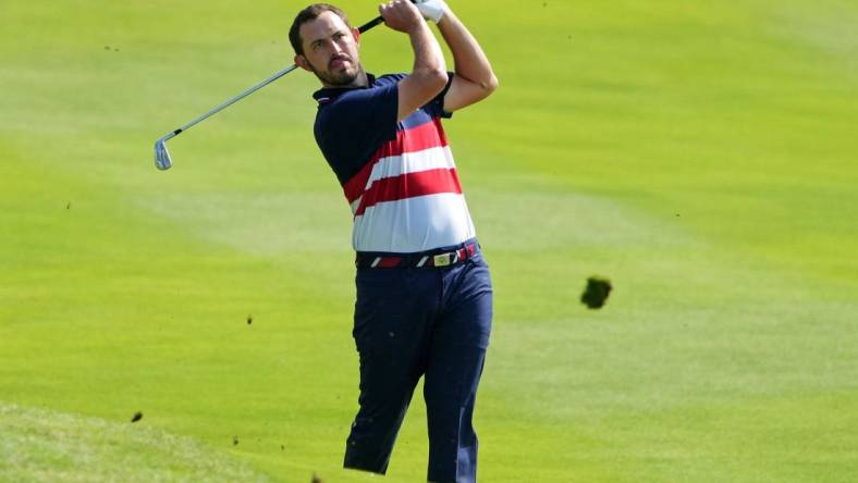 Oct 1, 2023; Rome, ITA; Team USA golfer Patrick Cantlay plays from the fairway on the second hole during the final day of the 44th Ryder Cup golf competition at Marco Simone Golf and Country Club. Mandatory Credit: Kyle Terada-USA TODAY Sports