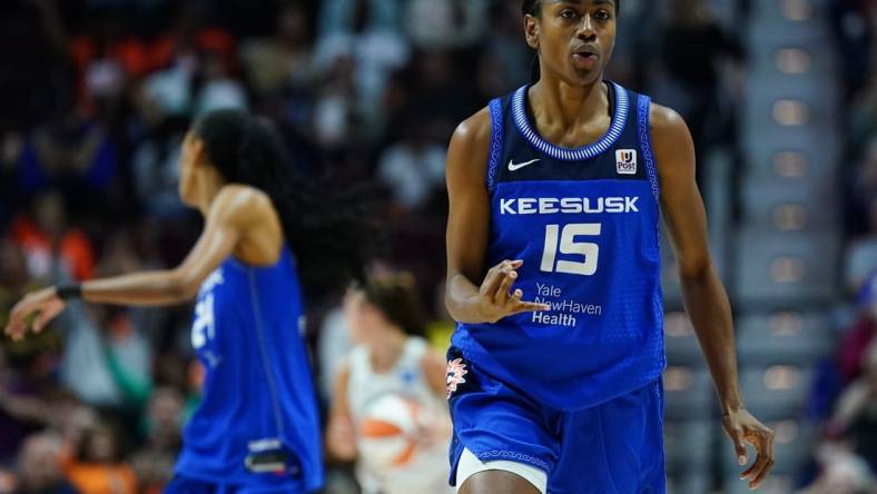 Oct 1, 2023; Uncasville, Connecticut, USA; Connecticut Sun guard Tiffany Hayes (15) reacts after her three point basket against the New York Liberty in the first half during game four of the 2023 WNBA Playoffs at Mohegan Sun Arena. Mandatory Credit: David Butler II-USA TODAY Sports