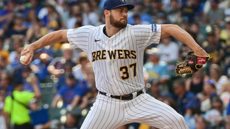 Oct 1, 2023; Milwaukee, Wisconsin, USA; Milwaukee Brewers pitcher Adrian Houser (37) pitches against the Chicago Cubs in the first inning at American Family Field. Mandatory Credit: Benny Sieu-USA TODAY Sports