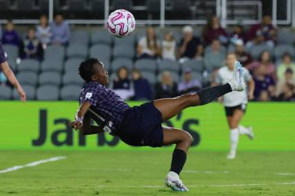 Oct 6, 2023; Louisville, Kentucky, USA; Racing Louisville FC forward Thembi Kgatlana (11) controls the ball in the first half against the Orlando Pride at Lynn Family Stadium. Mandatory Credit: EM Dash-USA TODAY Sports