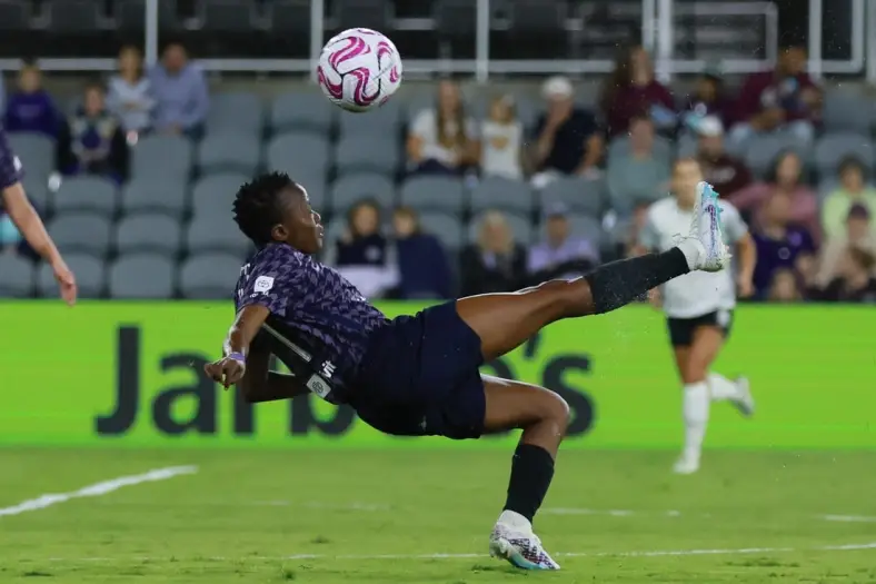 Oct 6, 2023; Louisville, Kentucky, USA; Racing Louisville FC forward Thembi Kgatlana (11) controls the ball in the first half against the Orlando Pride at Lynn Family Stadium. Mandatory Credit: EM Dash-USA TODAY Sports