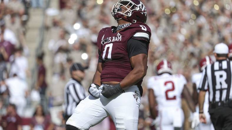 Oct 7, 2023; College Station, Texas, USA; Texas A&M Aggies defensive lineman Walter Nolen (0) reacts after a play during the second quarter against the Alabama Crimson Tide at Kyle Field. Mandatory Credit: Troy Taormina-USA TODAY Sports