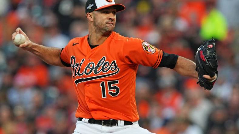 Oct 8, 2023; Baltimore, Maryland, USA; Baltimore Orioles starting pitcher Jack Flaherty (15) pitches during the fifth inning against the Texas Rangers during game two of the ALDS for the 2023 MLB playoffs at Oriole Park at Camden Yards. Mandatory Credit: Mitch Stringer-USA TODAY Sports