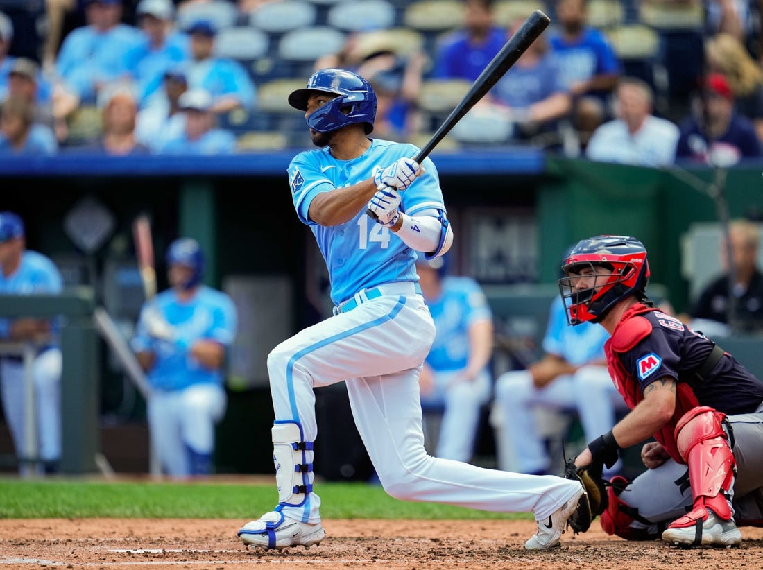 Sep 20, 2023; Kansas City, Missouri, USA; Kansas City Royals left fielder Edward Olivares (14) bats during the third inning against the Cleveland Guardians at Kauffman Stadium. Mandatory Credit: Jay Biggerstaff-USA TODAY Sports