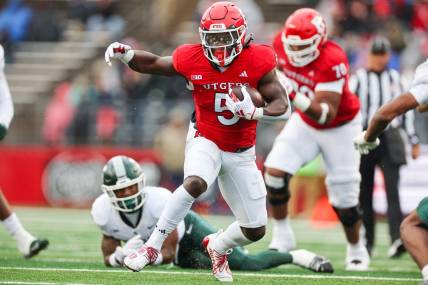 Oct 14, 2023; Piscataway, New Jersey, USA; Rutgers Scarlet Knights running back Kyle Monangai (5) carries the ball during the first half against the Michigan State Spartans at SHI Stadium. Mandatory Credit: Vincent Carchietta-USA TODAY Sports