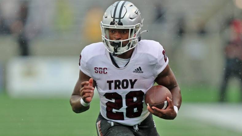 Oct 14, 2023; West Point, New York, USA; Troy Trojans running back Kimani Vidal (28) runs with the ball against the Army Black Knights during the first half at Michie Stadium. Mandatory Credit: Danny Wild-USA TODAY Sports