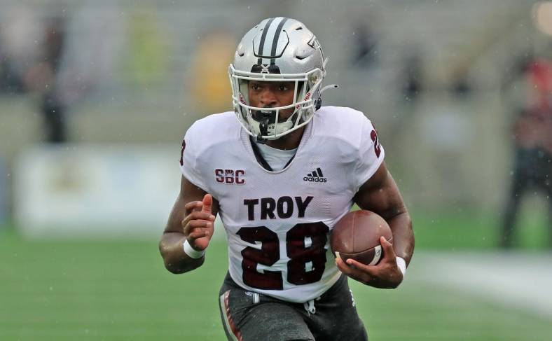 Oct 14, 2023; West Point, New York, USA; Troy Trojans running back Kimani Vidal (28) runs with the ball against the Army Black Knights during the first half at Michie Stadium. Mandatory Credit: Danny Wild-USA TODAY Sports