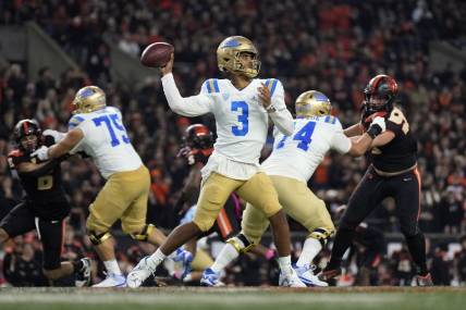 Oct 14, 2023; Corvallis, Oregon, USA; UCLA Bruins quarterback Dante Moore (3) throws the ball during the second half against the Oregon State Beavers at Reser Stadium. Mandatory Credit: Soobum Im-USA TODAY Sports