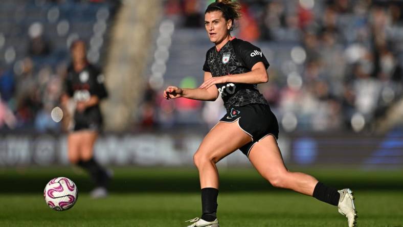 Oct 15, 2023; Bridgeview, Illinois, USA; Chicago Red Stars midfielder Cari Roccaro (4) controls the ball against OL Reign in the first half at SeatGeek Stadium. Mandatory Credit: Daniel Bartel-USA TODAY Sports