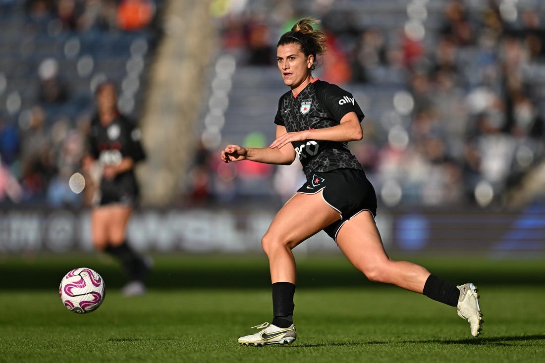 Oct 15, 2023; Bridgeview, Illinois, USA; Chicago Red Stars midfielder Cari Roccaro (4) controls the ball against OL Reign in the first half at SeatGeek Stadium. Mandatory Credit: Daniel Bartel-USA TODAY Sports