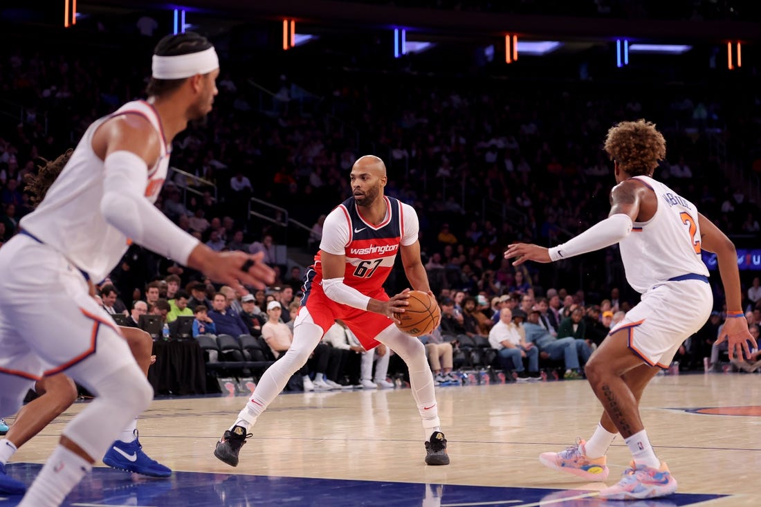 Oct 18, 2023; New York, New York, USA; Washington Wizards forward Taj Gibson (67) controls the ball against the New York Knicks during the fourth quarter at Madison Square Garden. Mandatory Credit: Brad Penner-USA TODAY Sports