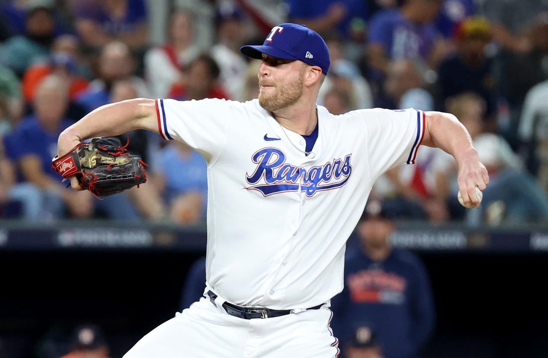 Oct 18, 2023; Arlington, Texas, USA; Texas Rangers pitcher Will Smith (51) throws during the seventh inning of game three of the ALCS against the Houston Astros in the 2023 MLB playoffs at Globe Life Field. Mandatory Credit: Kevin Jairaj-USA TODAY Sports