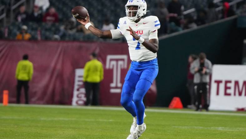 Oct 20, 2023; Philadelphia, Pennsylvania, USA; SMU Mustangs quarterback Kevin Jennings (7) throws the ball against the Temple Owls during the second half at Lincoln Financial Field. Mandatory Credit: Gregory Fisher-USA TODAY Sports