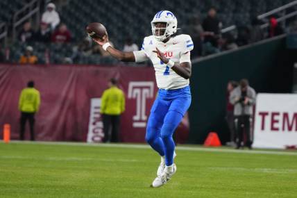 Oct 20, 2023; Philadelphia, Pennsylvania, USA; SMU Mustangs quarterback Kevin Jennings (7) throws the ball against the Temple Owls during the second half at Lincoln Financial Field. Mandatory Credit: Gregory Fisher-USA TODAY Sports