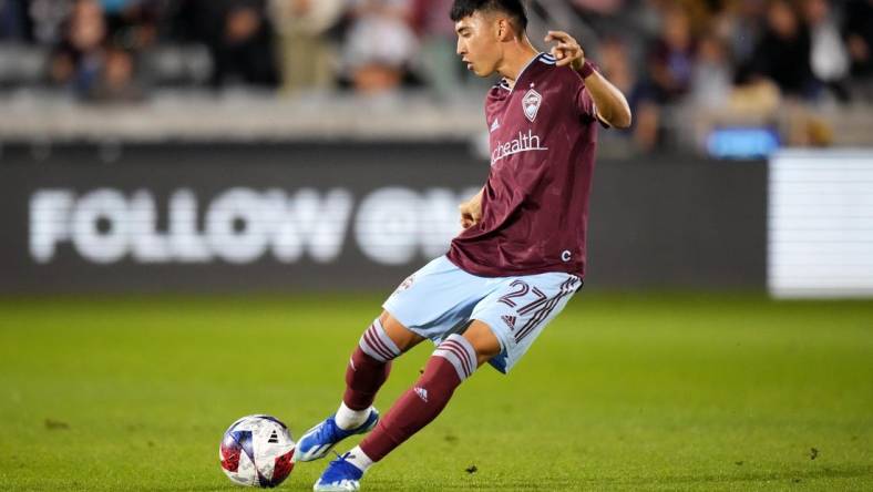 Oct 21, 2023; Commerce City, Colorado, USA; Colorado Rapids defender Sebastian Anderson (27) kicks the ball in the first half against the Real Salt Lake at Dick's Sporting Goods Park. Mandatory Credit: Ron Chenoy-USA TODAY Sports