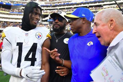 Oct 22, 2023; Inglewood, California, USA; Pittsburgh Steelers wide receiver George Pickens (14) and head coach Mike Tomlin meet with Los Angeles Rams defensive coordinator Raheem Morris following the game at SoFi Stadium. Mandatory Credit: Gary A. Vasquez-USA TODAY Sports