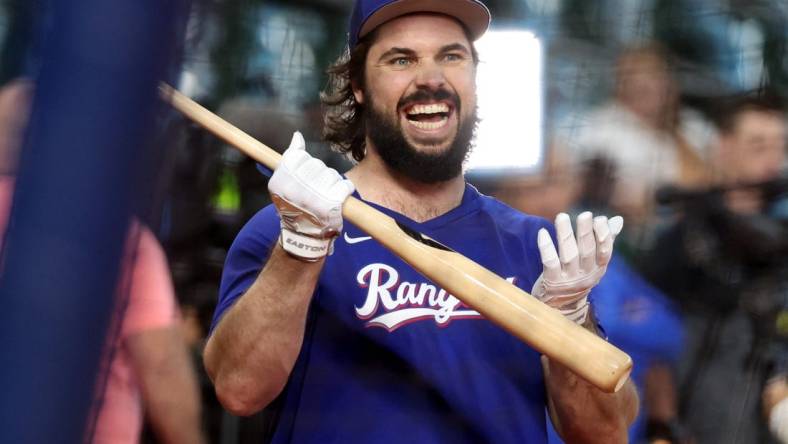 Oct 23, 2023; Houston, Texas, USA; (Editors Notes: Caption Correction) Texas Rangers catcher Austin Hedges (11) before game seven in the ALCS for the 2023 MLB playoffs at Minute Maid Park. Mandatory Credit: Thomas Shea-USA TODAY Sports