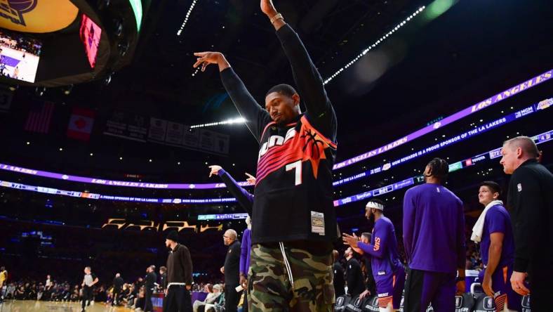 Oct 26, 2023; Los Angeles, California, USA; Phoenix Suns guard Bradley Beal (3) reacts after forward Kevin Durant (35) scores a three point basket against the Los Angeles Lakers during the second half at Crypto.com Arena. Mandatory Credit: Gary A. Vasquez-USA TODAY Sports