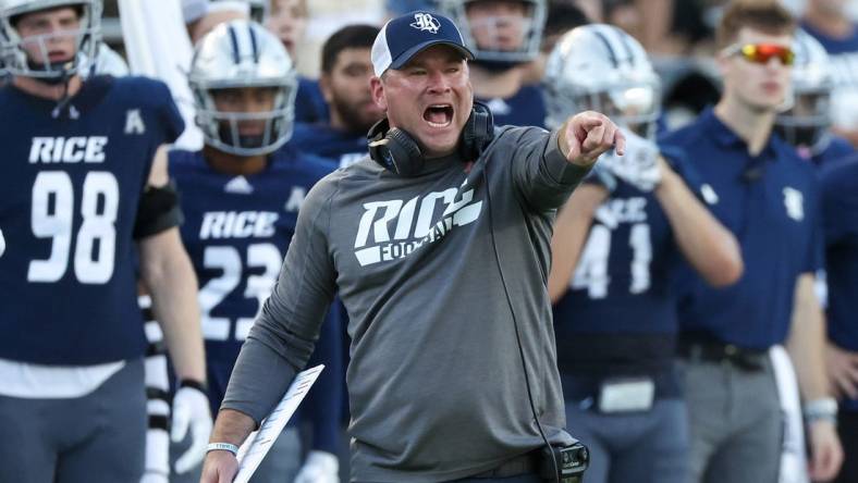 Oct 28, 2023; Houston, Texas, USA; Rice Owls head coach Mike Bloomgren argues about the time clock in the second half against the Tulane Green Wave at Rice Stadium. Mandatory Credit: Thomas Shea-USA TODAY Sports