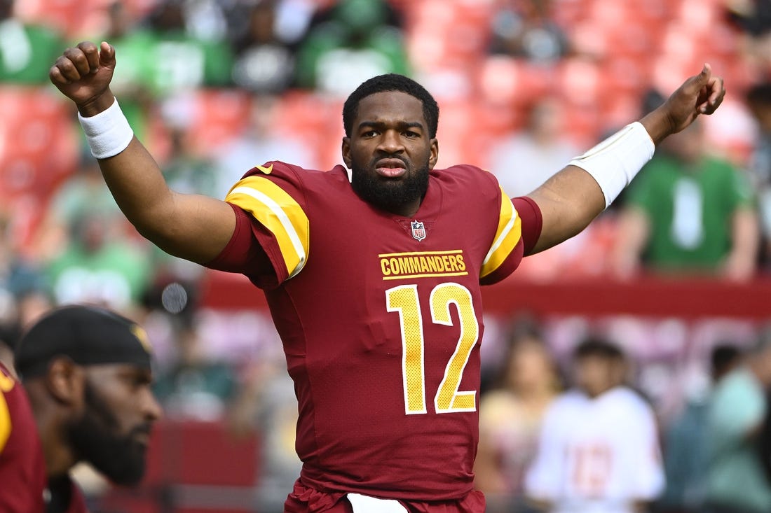 Oct 29, 2023; Landover, Maryland, USA; Washington Commanders quarterback Jacoby Brissett (12) on the field against the Philadelphia Eagles at FedExField. Mandatory Credit: Brad Mills-USA TODAY Sports