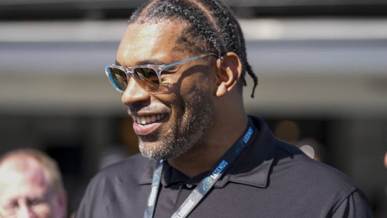 Oct 29, 2023; Charlotte, North Carolina, USA; Former Panther defensive end Julius Peppers awaits his induction into the Panthers Ring of Honor during the first quarter between the Carolina Panthers and the Houston Texans at Bank of America Stadium. Mandatory Credit: Jim Dedmon-USA TODAY Sports