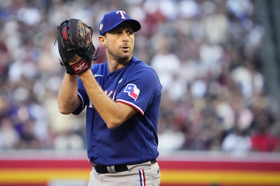 Texas Rangers starting pitcher Max Scherzer (31) prepares to throw a pitch against the Arizona Diamondbacks during the first inning in game three of the 2023 World Series at Chase Field on Oct. 30, 2023, in Phoenix, Arizona.